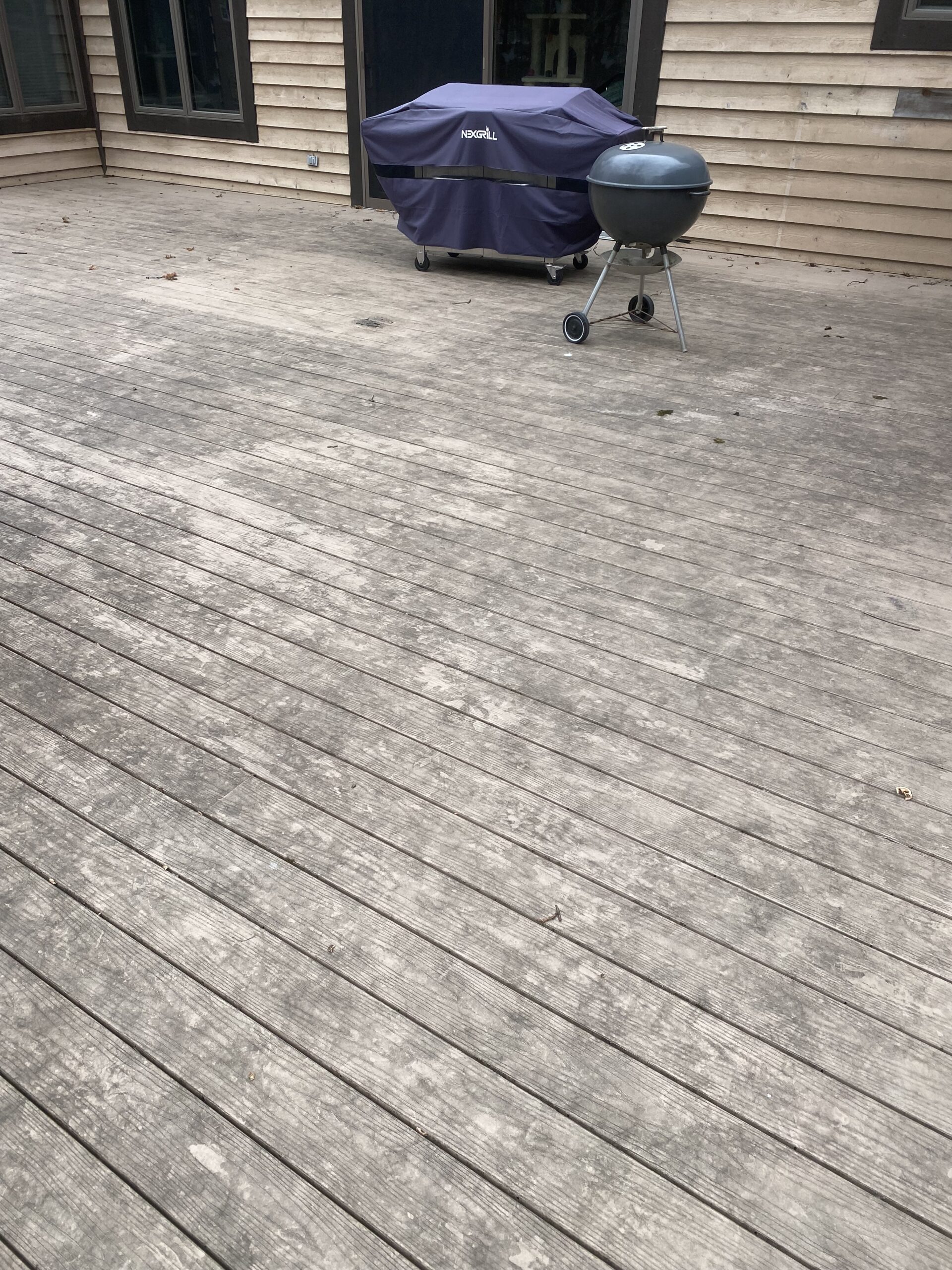 Deck before window cleaning by Blueline Cleaning Services